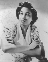 Lil Hardin publicity photo, seated at piano